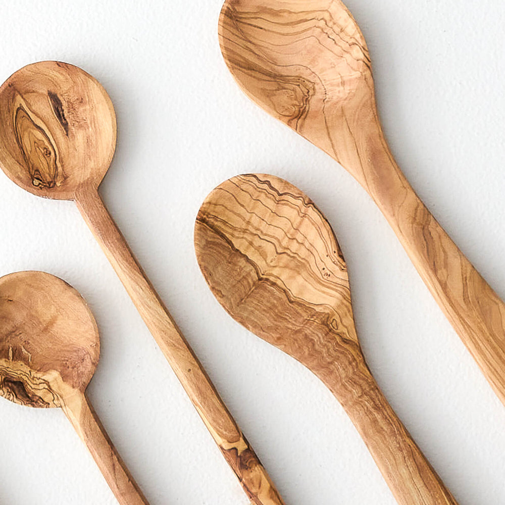 Olive wood cooking spoon sets handcarved by artisans in Tunisia.