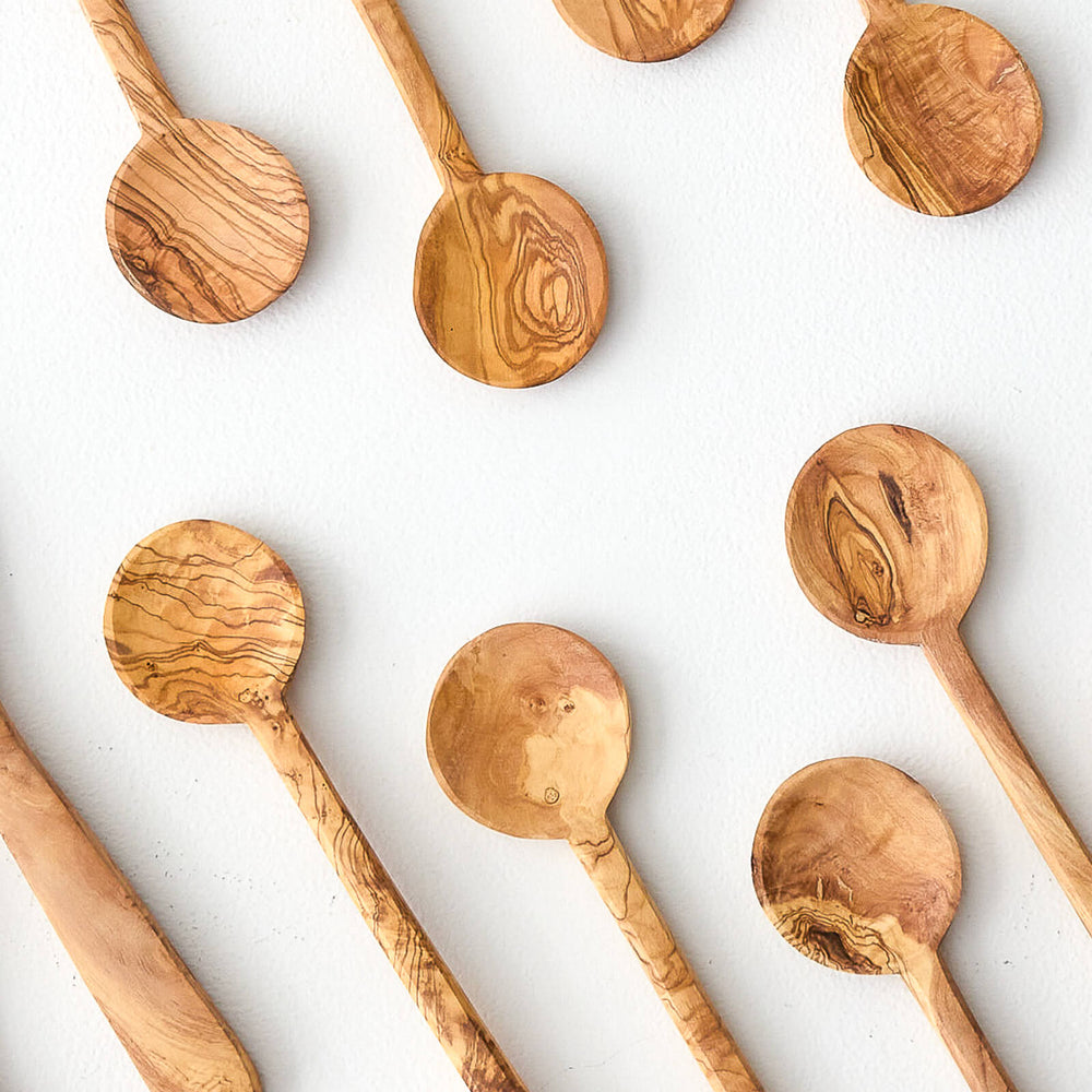 
                  
                    Variety of handcrafted olive wood spoons by Fairkind.
                  
                