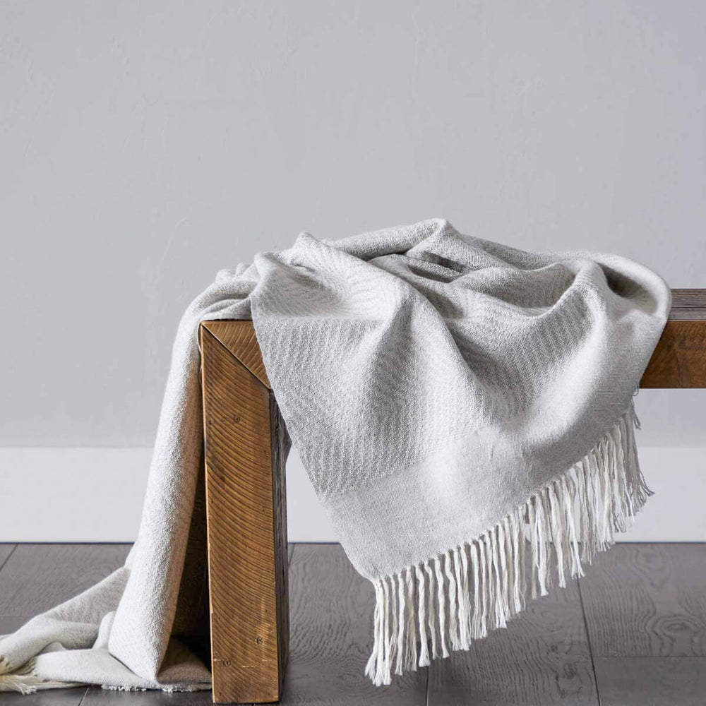 
                  
                    La Loma blanket handwoven in Peru luxury and one of a kind gift made by master artisans.
                  
                