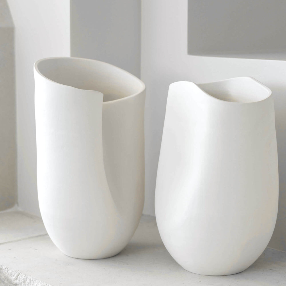 Large and Medium Zoya Terracotta Vases by Fairkind styled on stone mantle.