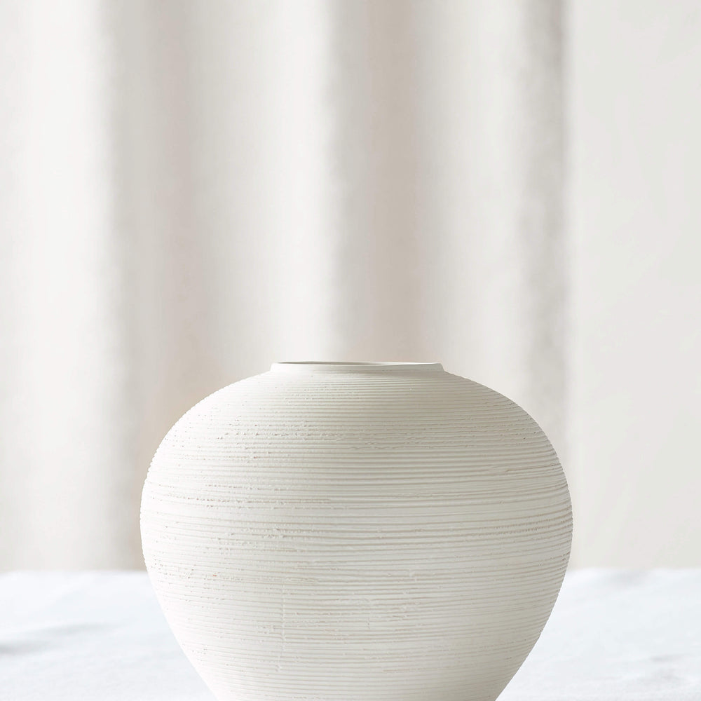 Small Zarina Vase by Fairkind. Handmade in Morocco with raw white bisque clay.