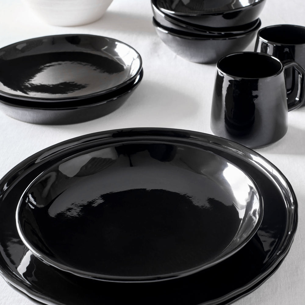 Riad Dinnerware by Fairkind styled on white table.