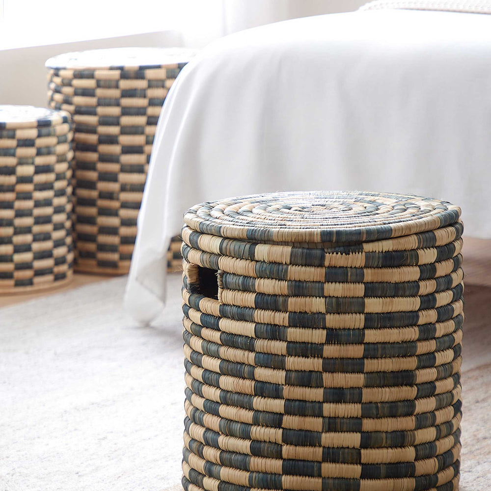 
                  
                    Handmade Azibo Baskets in modern bedroom. Malawi Collection by Fairkind.
                  
                