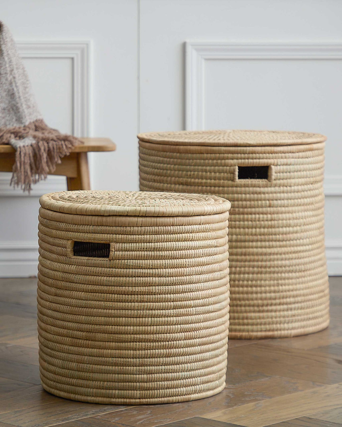 
                  
                    Set of two handwoven storage baskets made in Malawi.
                  
                