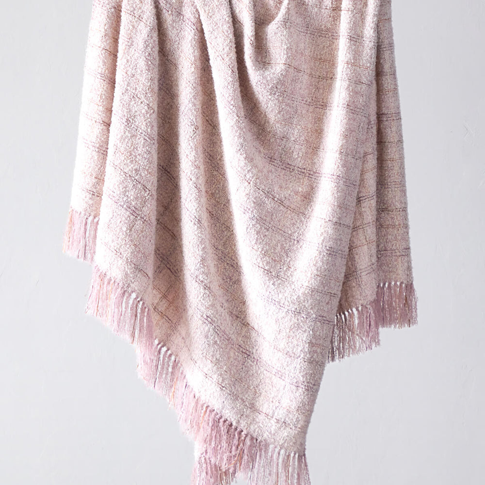 Fairkind Cariño pink alpaca throw blanket handwoven by artisans in Peru.