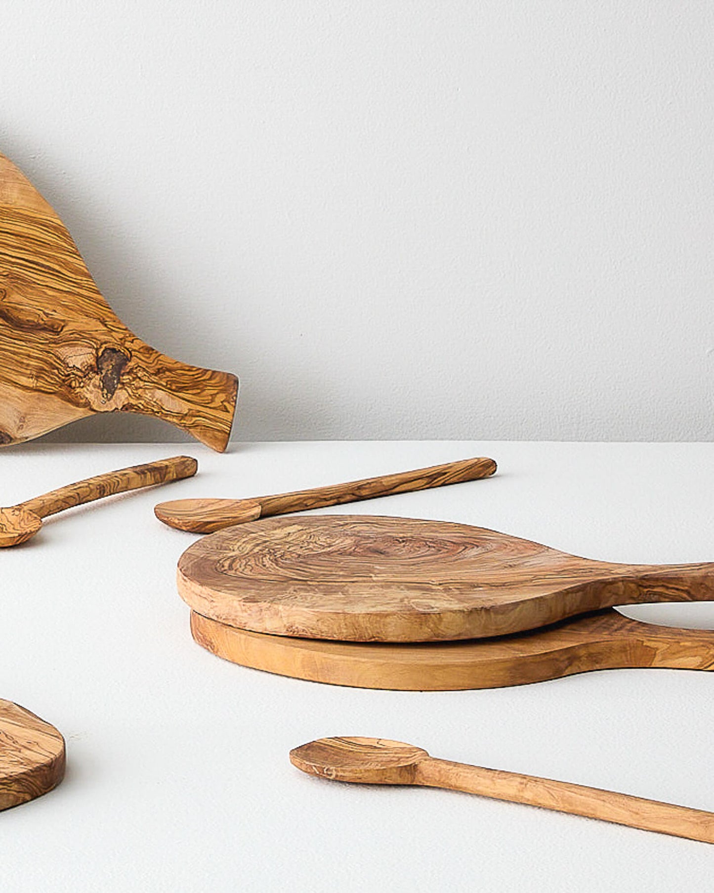 
                  
                    Luxury olive wood serving boards made by master artisans in Tunisia.
                  
                