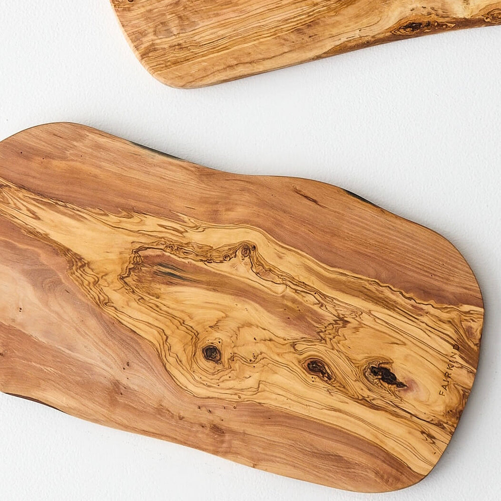 
                  
                    Olive wood serving boards handmade by master artisans in Tunisia.
                  
                