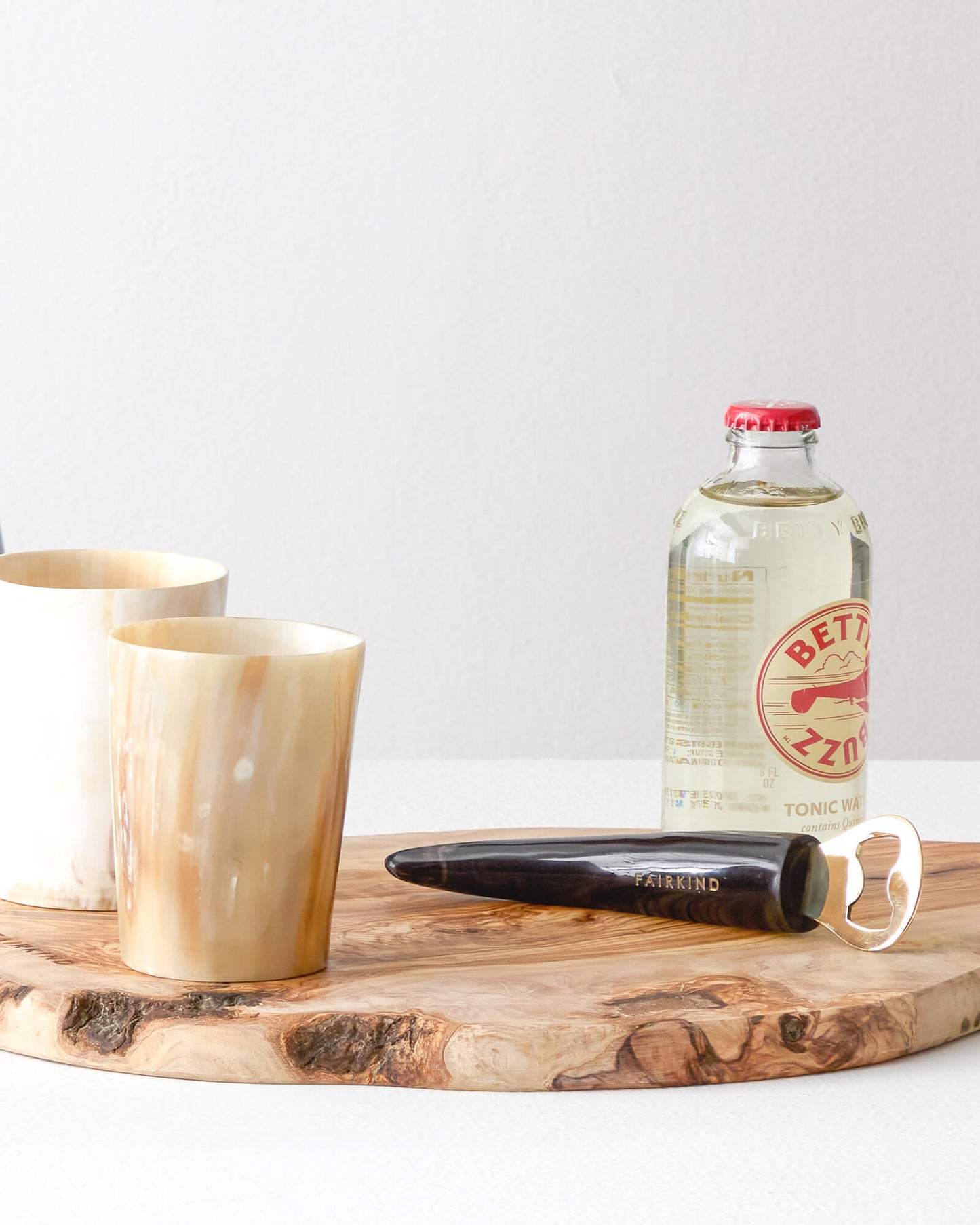 
                  
                    Handcrafted barware bottle opener and tumbler set ethically made Ankole horn and brass.
                  
                