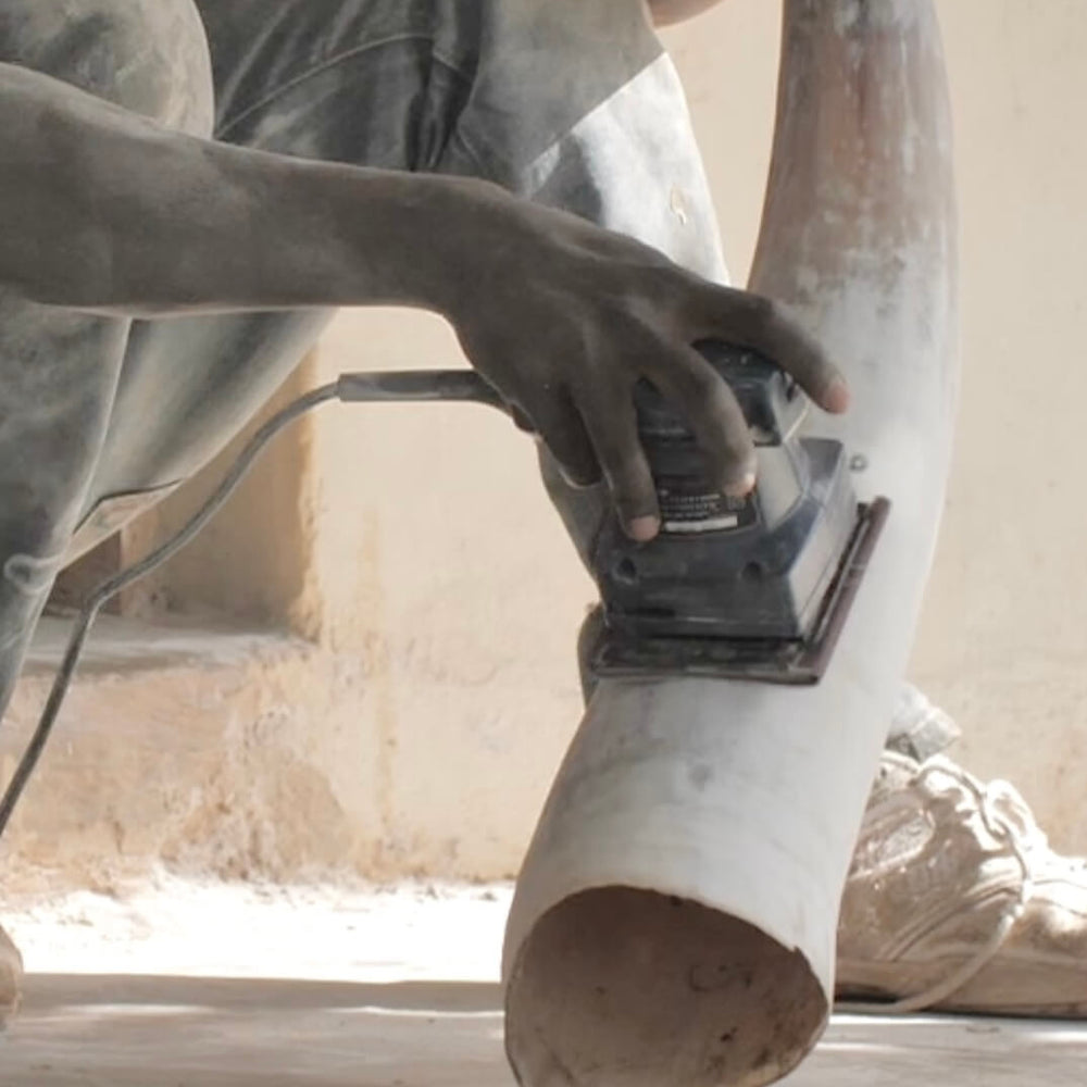 
                  
                    Ugandan artisan making handcrafted horn utensil holder. Ethically sourced and handmade in Uganda.
                  
                