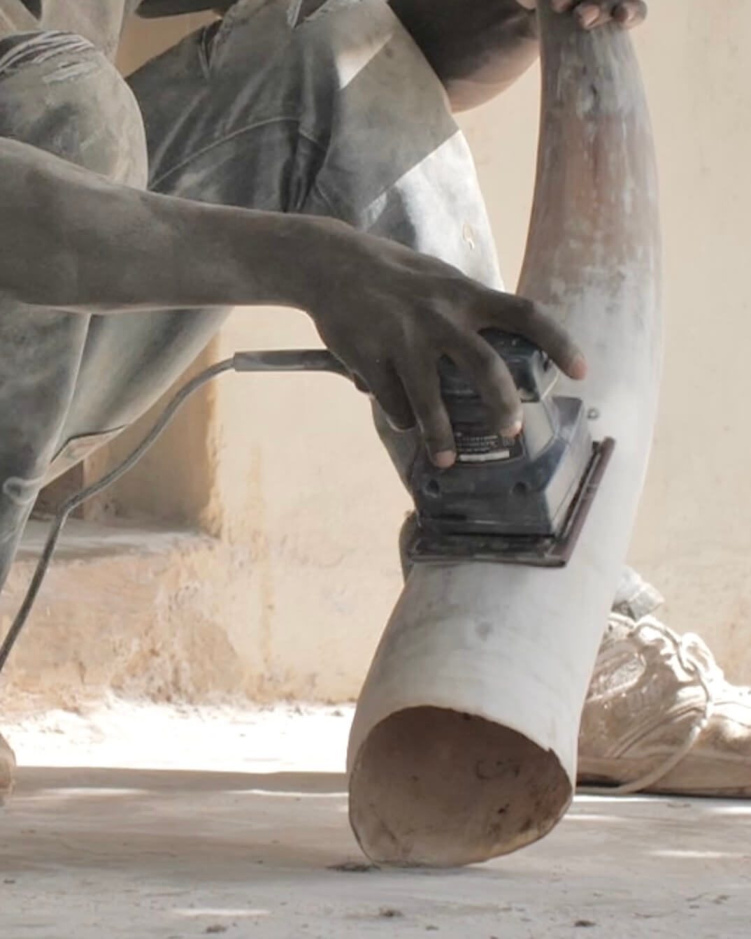 
                  
                    Ugandan artisan making handcrafted horn utensil holder. Ethically sourced and handmade in Uganda.
                  
                