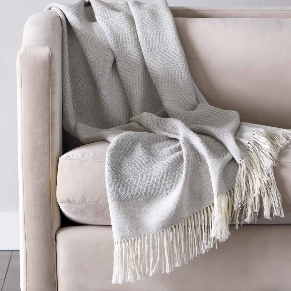 
                  
                    Modern beautiful neutral throw with fringe for sofa Fairkind handwoven in Peru.
                  
                