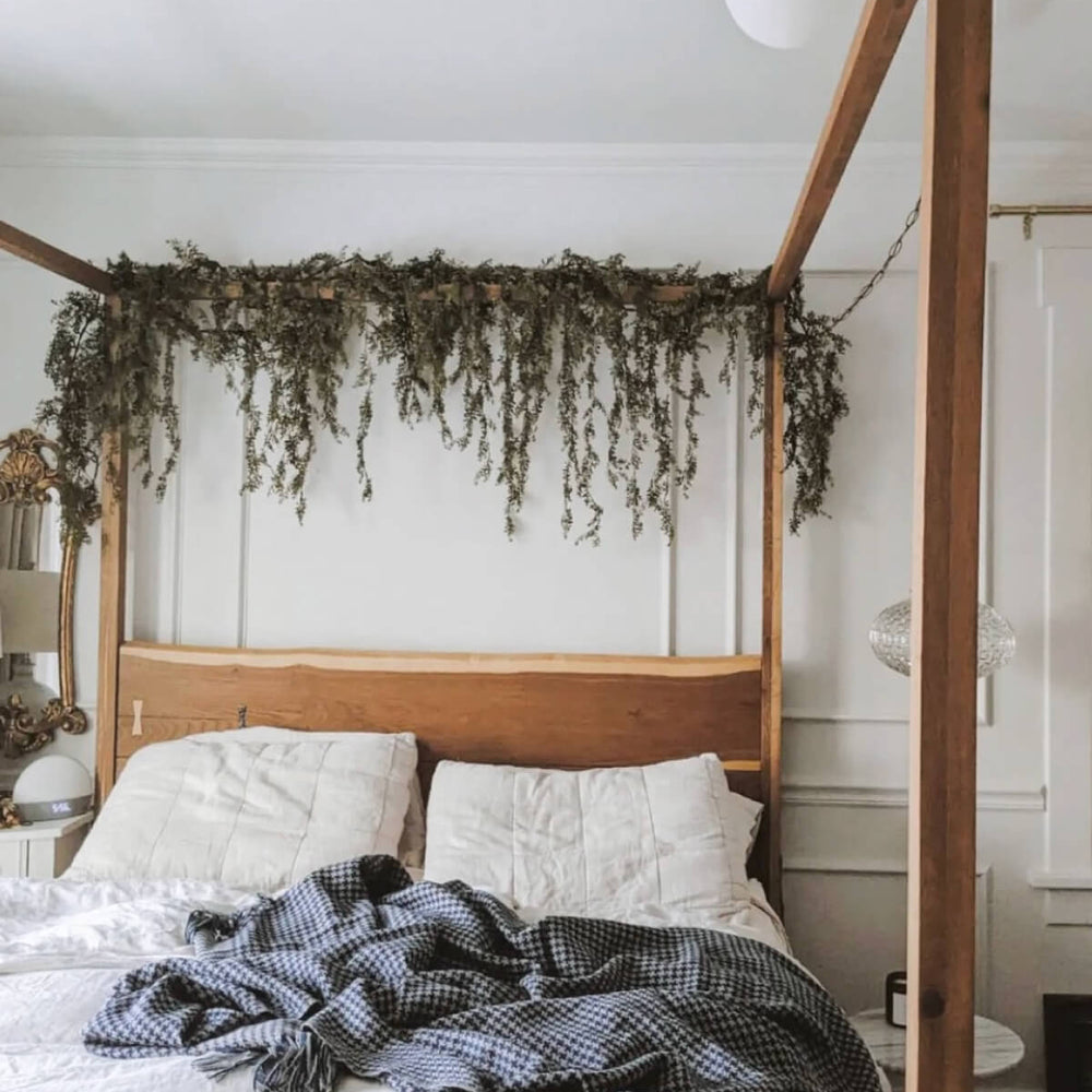 
                  
                    Canopy bed in romantic master suite with Fairkind's Alta Mar alpaca throw. Photo via @thelittledovehome
                  
                