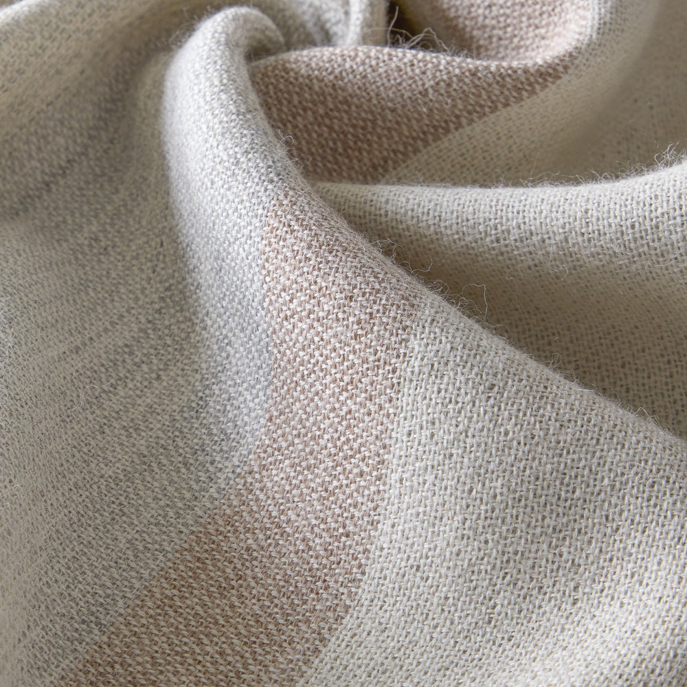 
                  
                    Detail of handmade Altura striped baby alpaca throw
                  
                