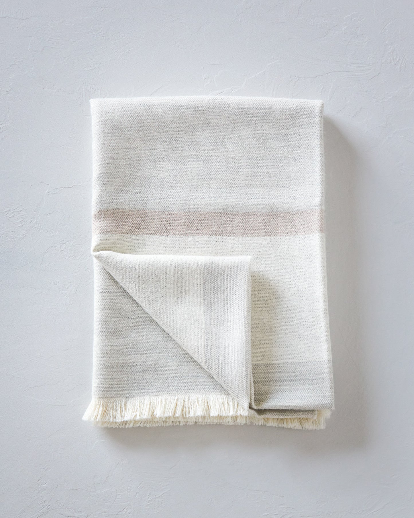 
                  
                    Folded Fairkind Altura baby alpaca throw blanket
                  
                