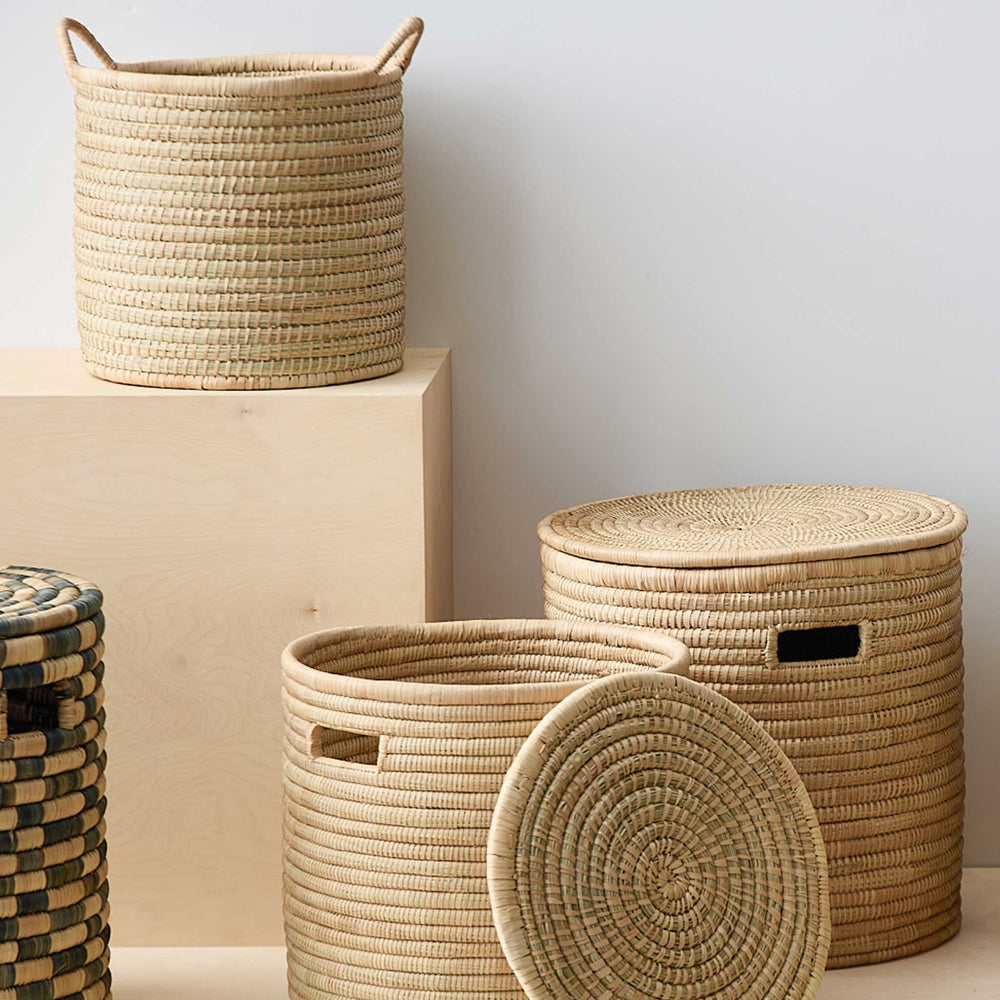 
                  
                    Collection of handwoven baskets made in Malawi with ethically-sourced palm.
                  
                