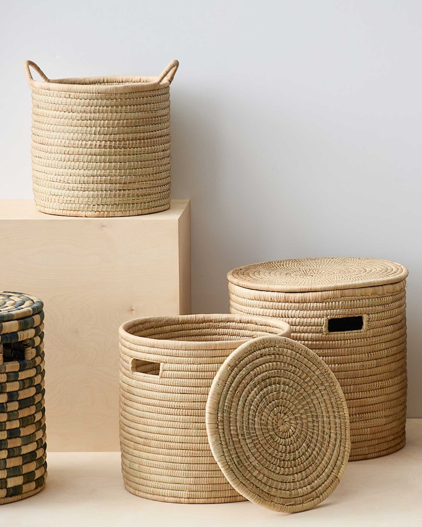 
                  
                    Collection of handwoven baskets made in Malawi with ethically-sourced palm.
                  
                