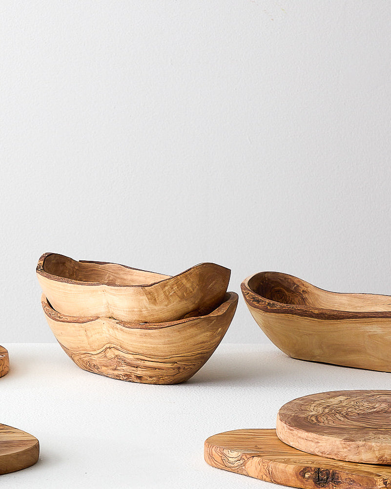 
                  
                    Collection of Medina Serving bowls and other olive wood servingware handcrafted in Tunisia.
                  
                