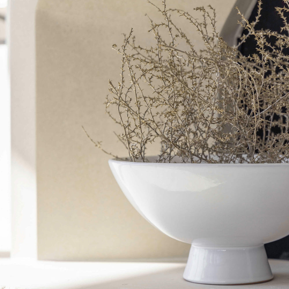 
                  
                    Rami Pedestal Bowl in Light Gray. Handcrafted by artisans in Morocco.
                  
                