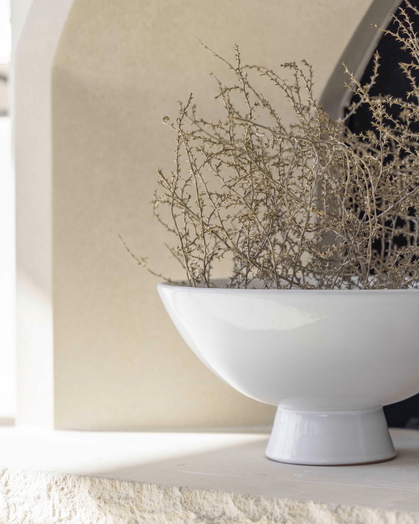 
                  
                    Rami Pedestal Bowl in Light Gray. Handcrafted by artisans in Morocco.
                  
                
