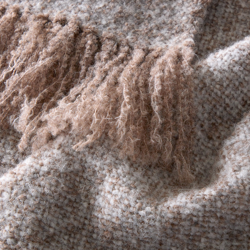 
                  
                    Detail of La Tierra alpaca throw by Fairkind hypoallergenic and handmade in Peru.
                  
                