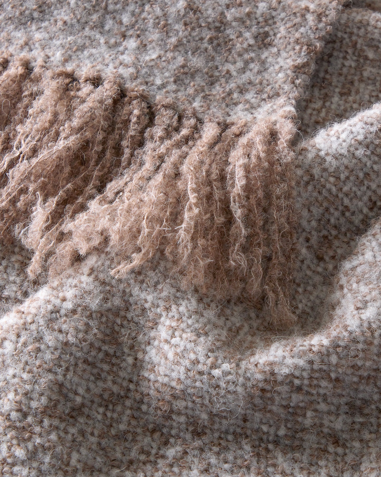 
                  
                    Detail of La Tierra alpaca throw by Fairkind hypoallergenic and handmade in Peru.
                  
                