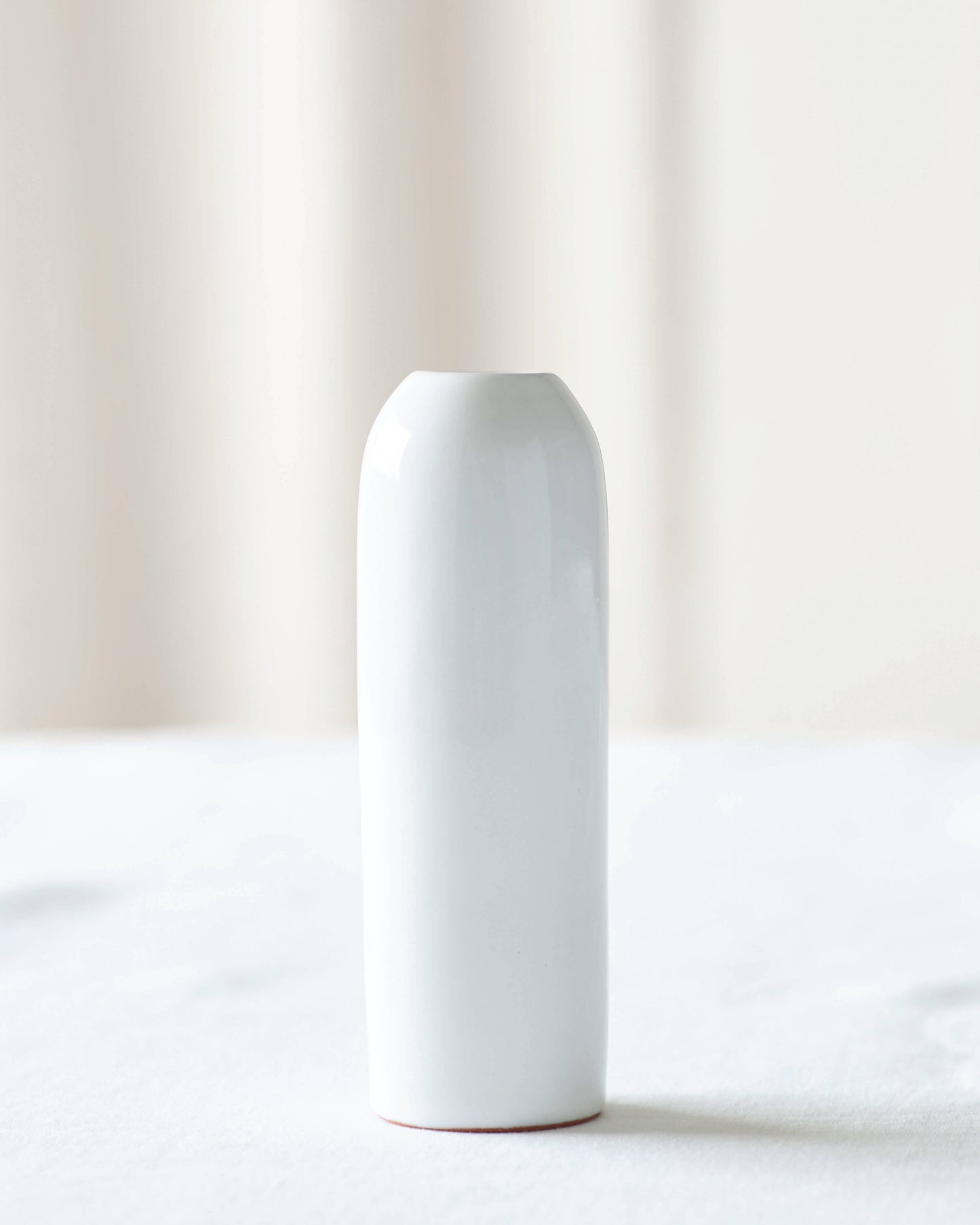 
                  
                    Yasmine Taper Holder in white, handmade by artisans in Morocco.
                  
                