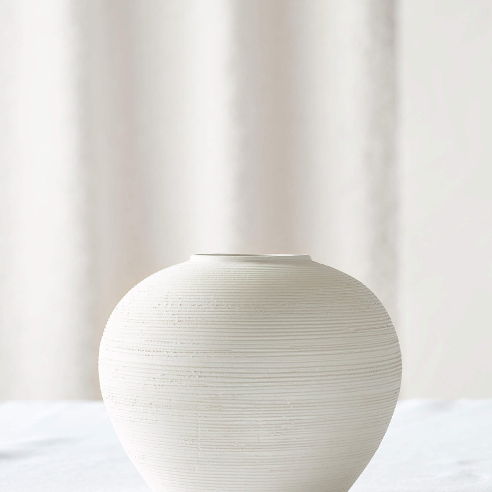 
                  
                    Small Zarina Vase by Fairkind. Handmade in Morocco with raw white bisque clay.
                  
                