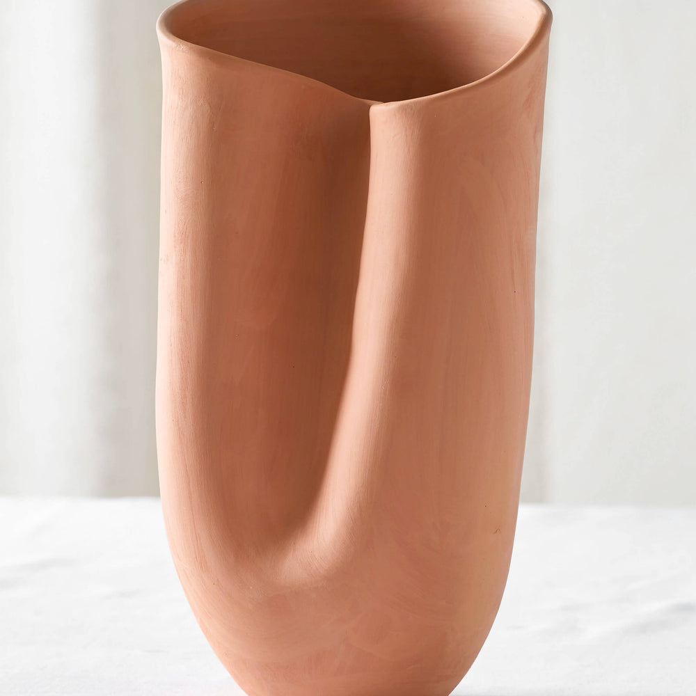 
                  
                    Large sculptural terracotta vase, one of three sizes of the Tahj Terracotta Vases by Fairkind.
                  
                