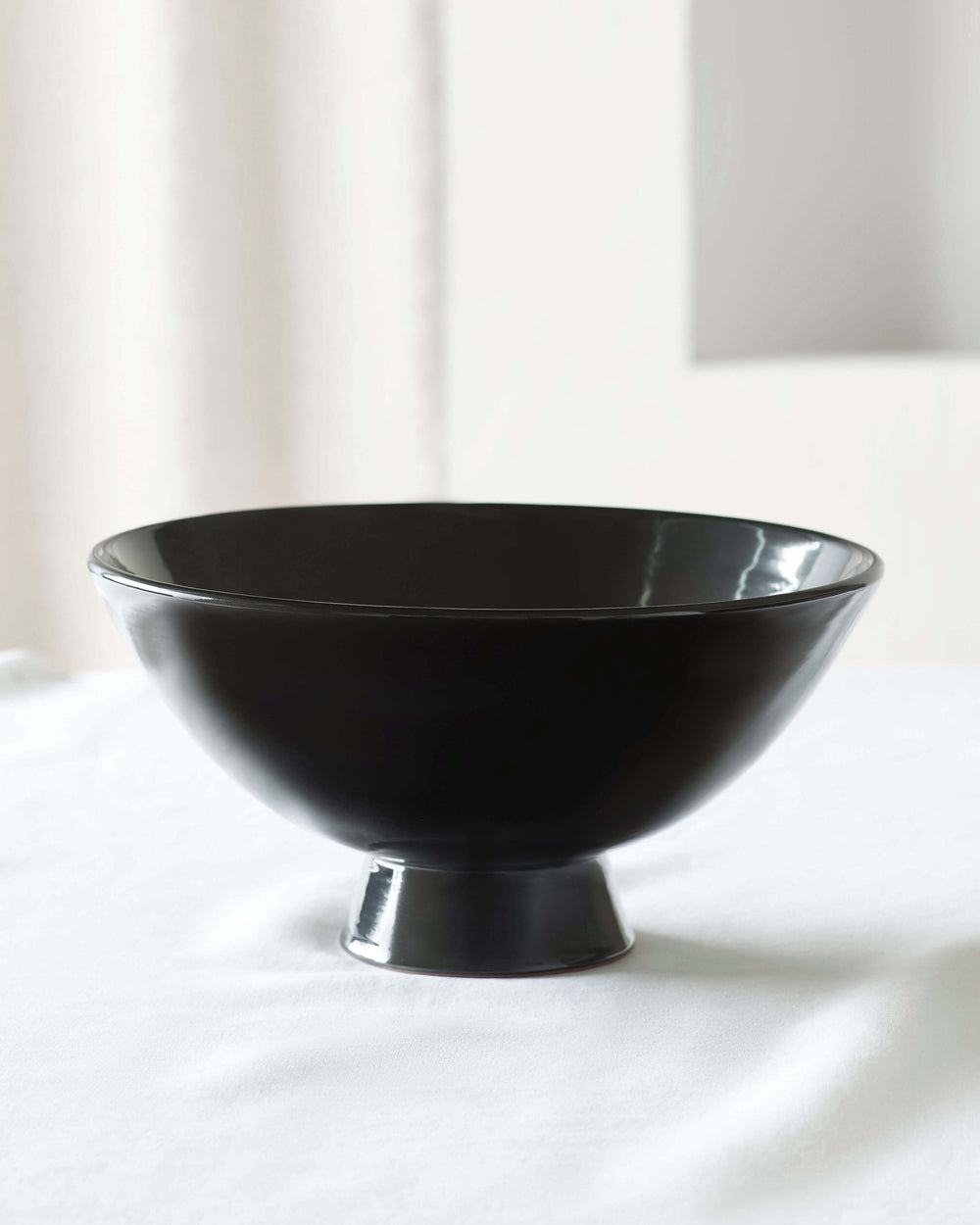 Rami Pedestal Bowl in Black, handmade by artisans in Safi, Morocco.