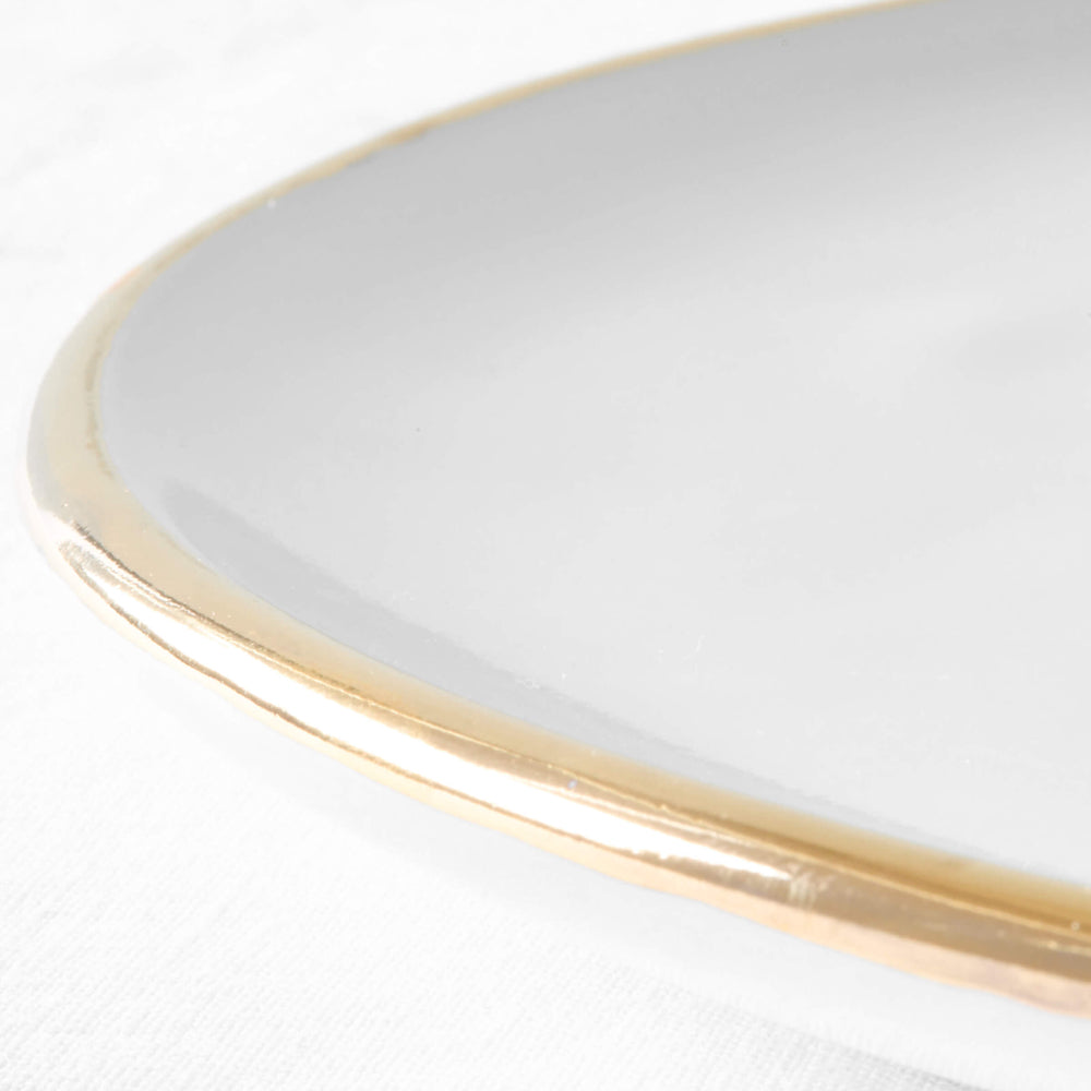 
                  
                    Edge detail close-up of Fez Gold-Rimmed Salad Plate by Fairkind.
                  
                