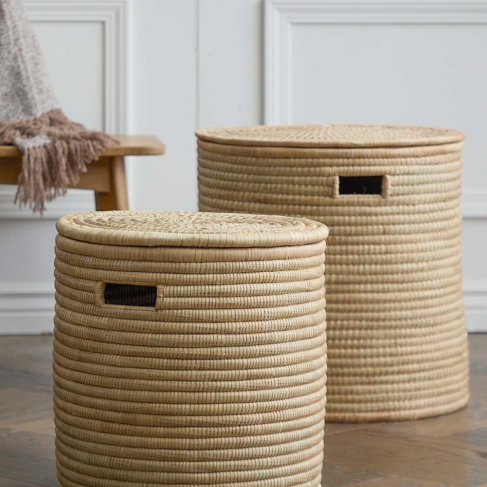 
                  
                    Set of two handwoven storage baskets made in Malawi.
                  
                