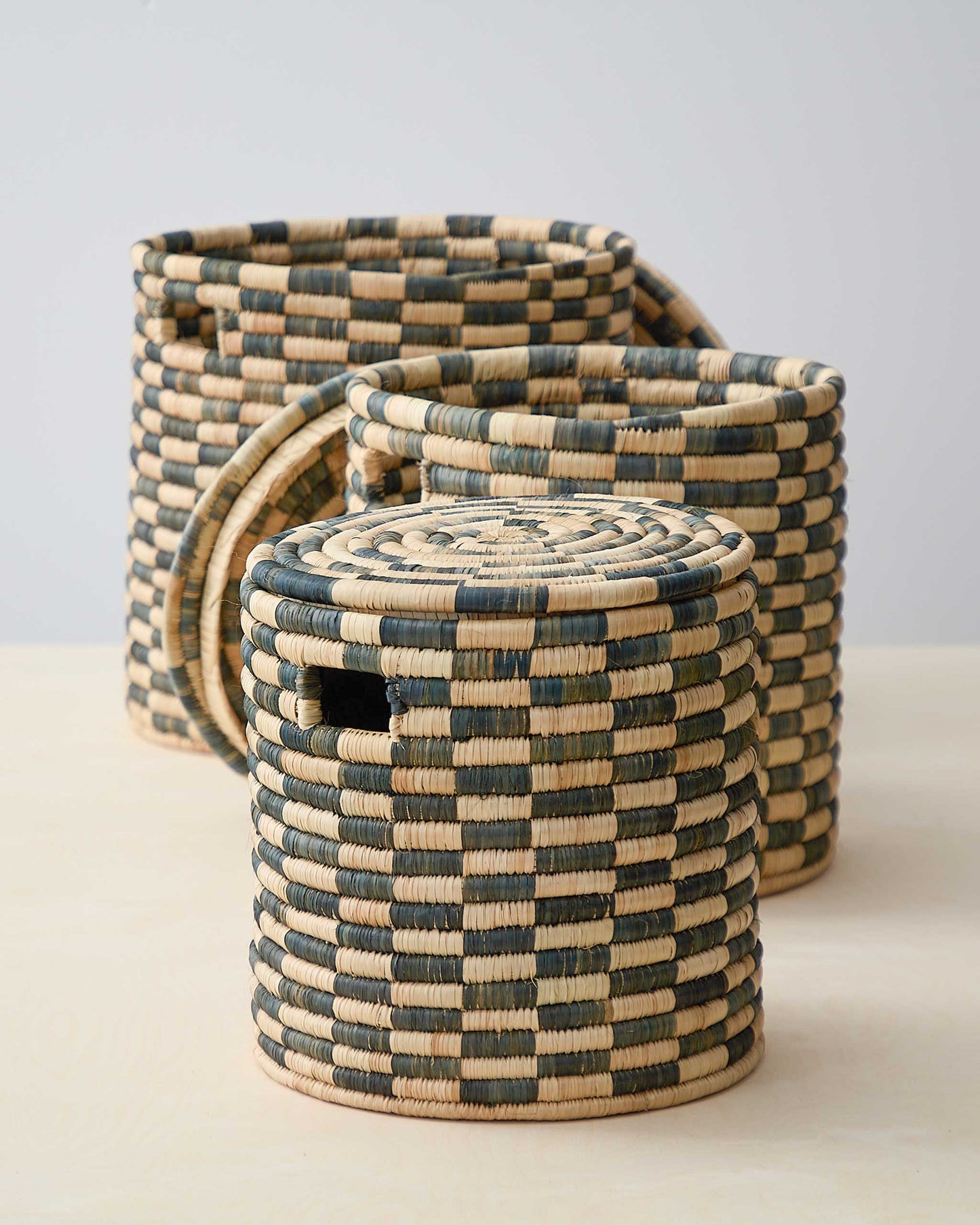Azibo Storage Baskets by Fairkind. Handwoven with Ilala palm by master artisans in Malawi.