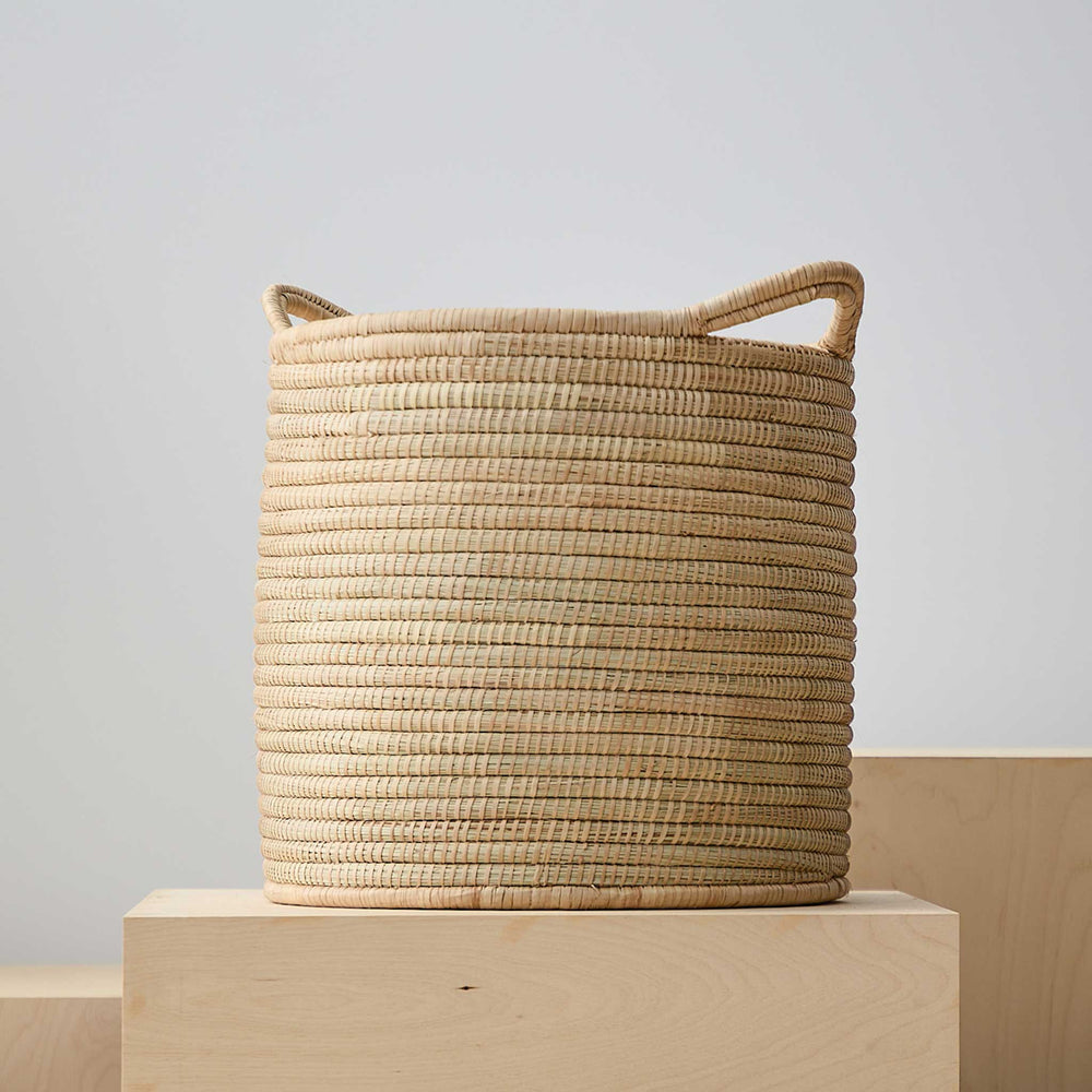 
                  
                    Large Ilala palm storage basket with handles. Luka Storage Baskets by Fairkind.
                  
                