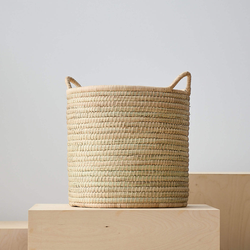 
                  
                    Medium Luka Storage Basket with handles. Handwoven by master artisans in Malawi.
                  
                