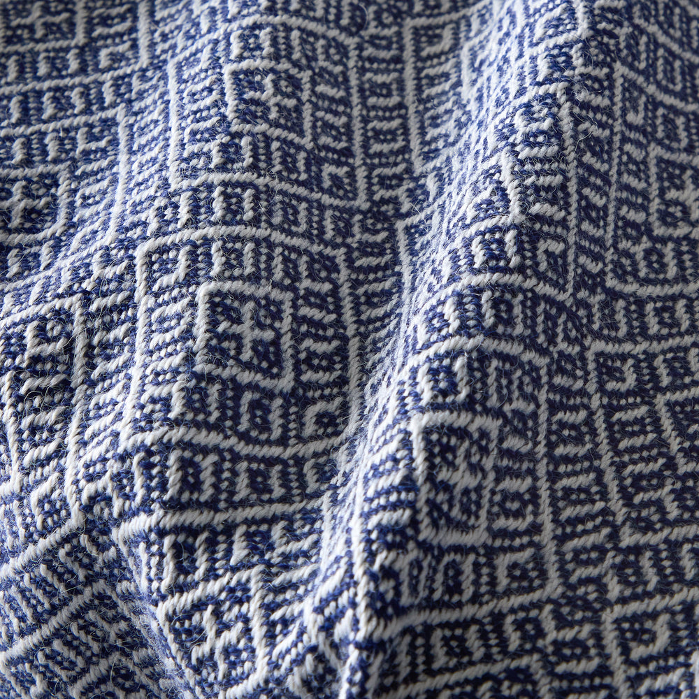 Detail of Fairkind Pacifica alpaca throw hand-loomed by artisans in Peru in fair trade environment super soft luxury fabric.